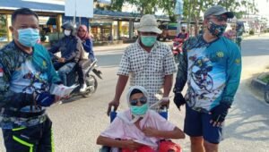 Kodim 0317/TBK Adakan Fun Bike Bertabur Bagi-Bagi Masker